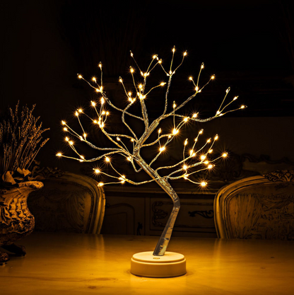 LED light tree as decoration in the dark living room