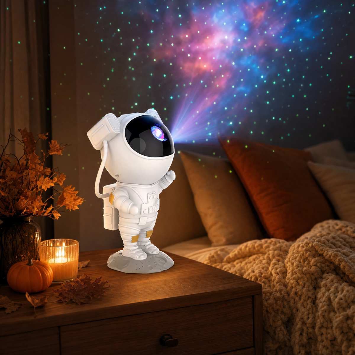 Astronaut star projector on the nightstand projects galaxy and stars onto the bedroom wall