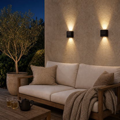 Two SolarGlow solar wall lights on the house wall at the terrace