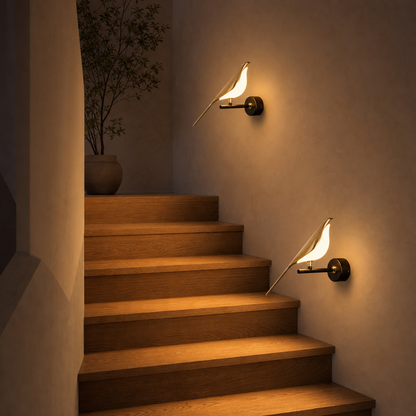 Two Avia LED bird wall lights on the staircase