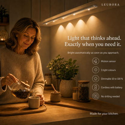 Woman in the kitchen with the SmartKitchen LED under cabinet light, motion sensor, 3 light colours and dimmable