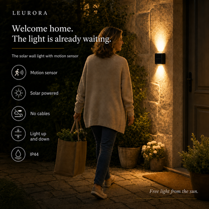 Woman comes home in the evening, the SolarGlow solar outdoor light switches on automatically via motion sensor